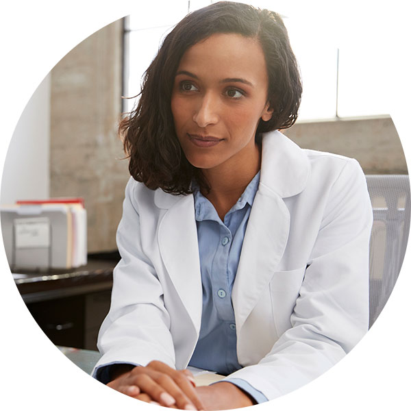Beautiful doctor listening to patient